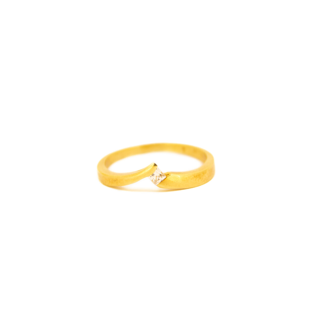 Anillo oro 18k forma abierta pico con circonita central
