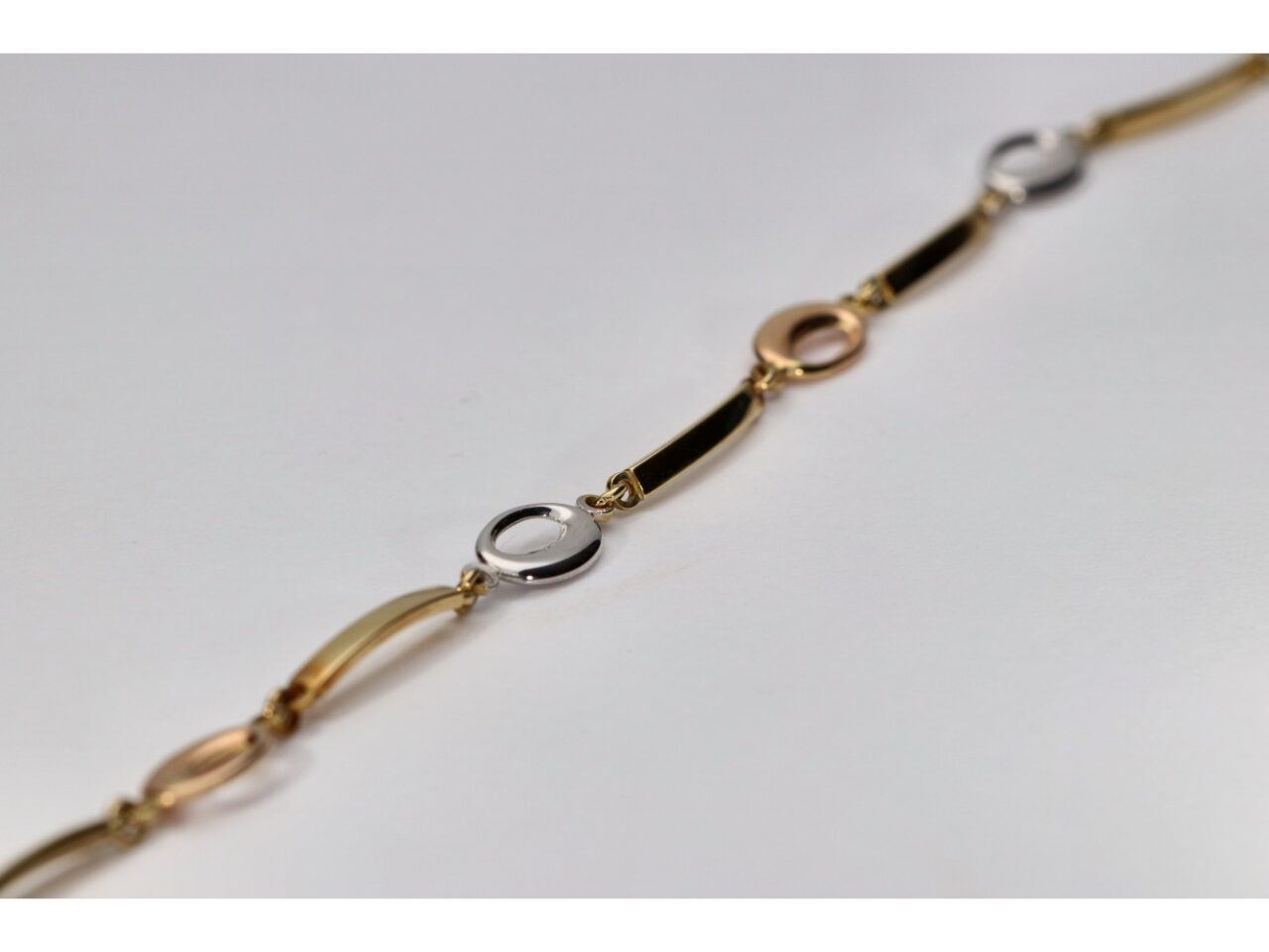 PULSERA ORO 18K TRICOLOR OBAL CALADO Y BARRA - Imagen 2