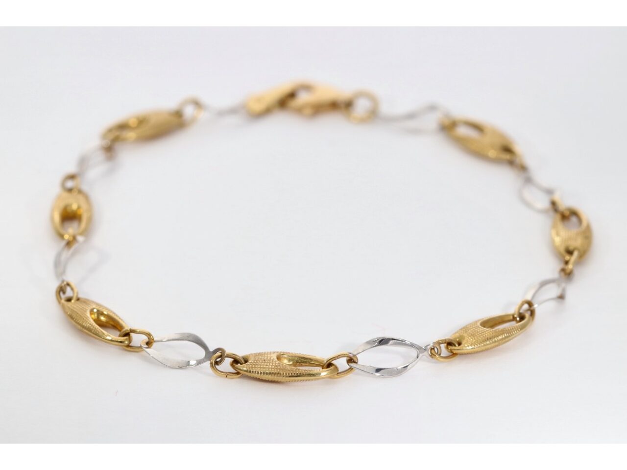 PULSERA ORO 18K BICOLOR ESLABON OBAL CALADO
