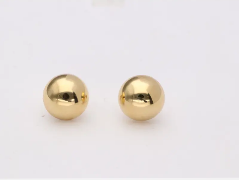 Pendientes en oro 18k media bola