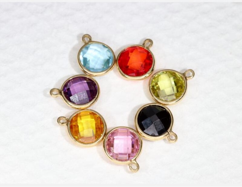 COLGANTE ORO 18K CON PIEDRA COLOR HOROSCOPO