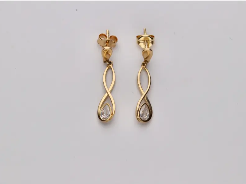 Pendiente oro 18k cruzado con circonita